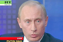 Владимир Путин отвечает на вопросы пользователей интернета, кадр телеканала Russia Today.