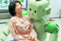 Экспериментальный робот-сиделка RI-MAN. Фото с сайта www.japantimes.co.jp